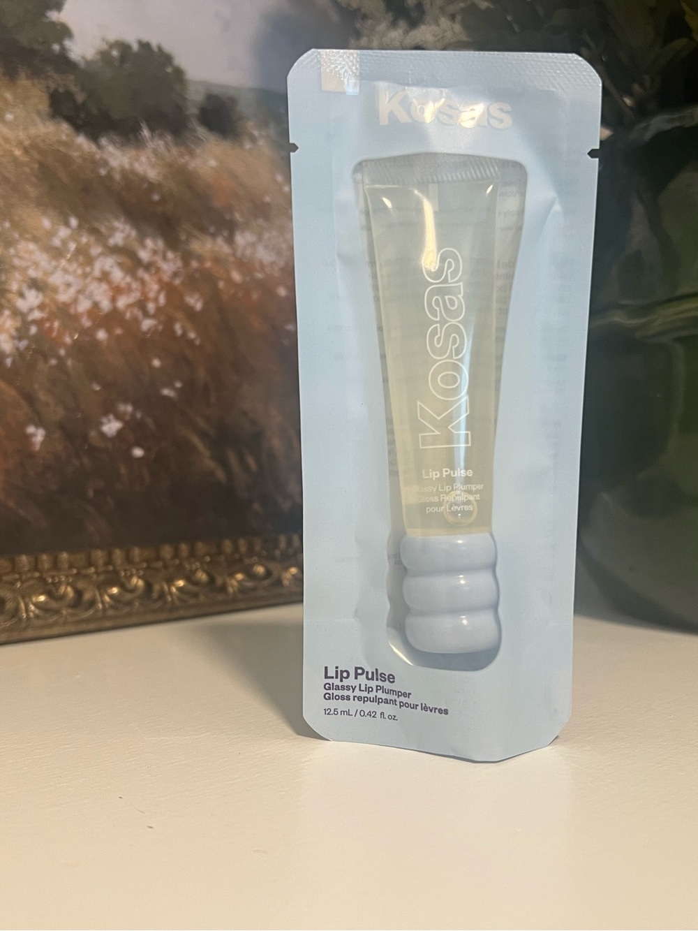 Kosas Lip Pulse Glassy Lip Plumper - Pale Blue Packaging